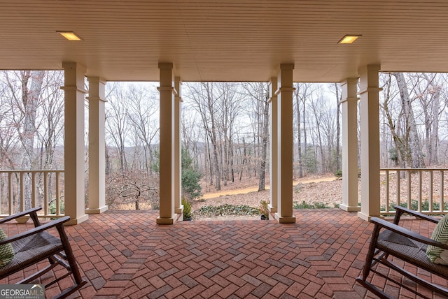 view of patio featuring a porch