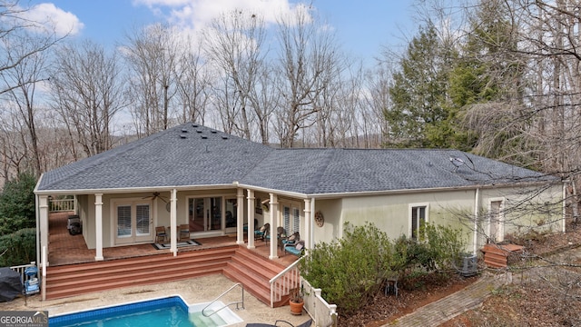 back of house featuring a patio, a pool side deck, cooling unit, ceiling fan, and french doors