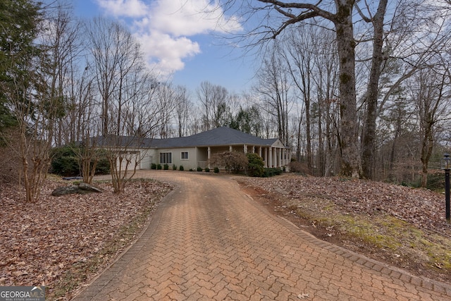 ranch-style home with a garage