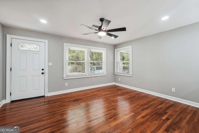 foyer entrance featuring ceiling fan and dark hardwood / wood-style flooring