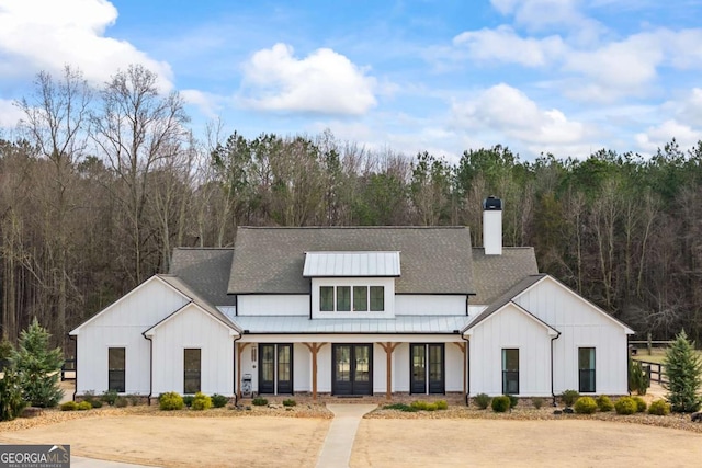 modern farmhouse with a porch