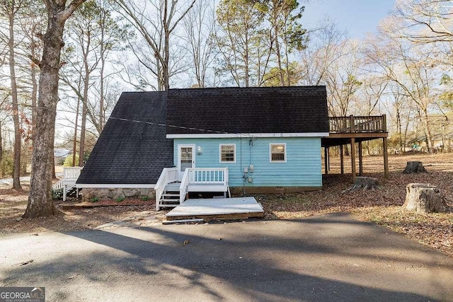 view of front of house with a wooden deck