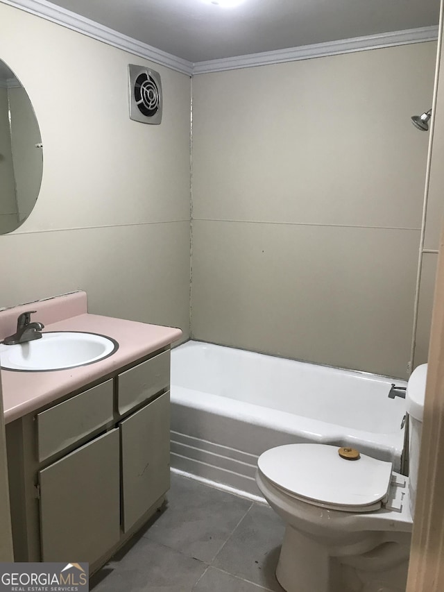 bathroom featuring vanity, crown molding, tile patterned floors, and toilet