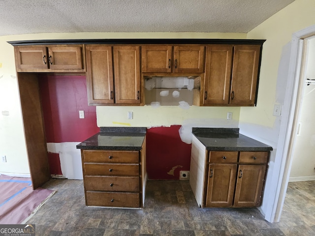 kitchen featuring a textured ceiling