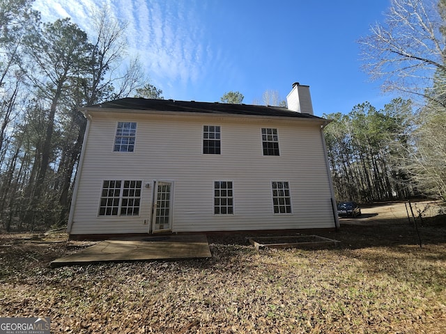 rear view of property with a patio