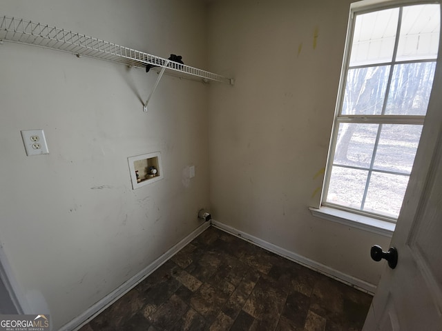 clothes washing area featuring washer hookup