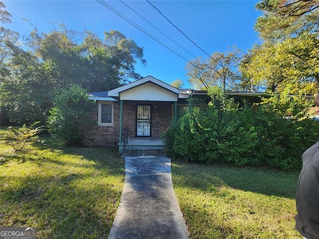 view of front of house with a front lawn