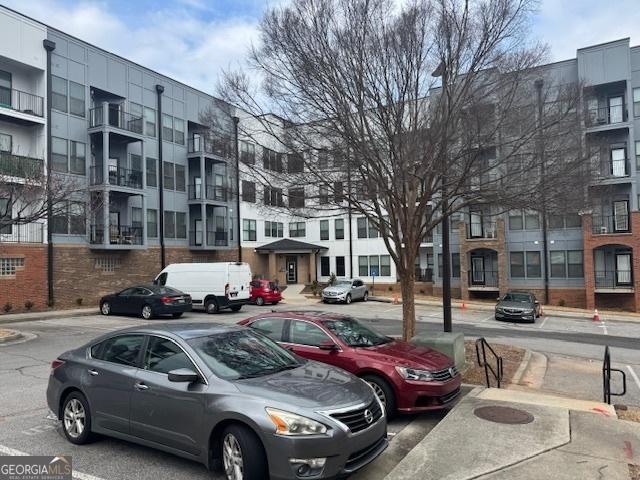 view of parking / parking lot