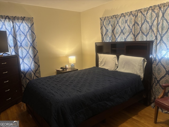 bedroom featuring hardwood / wood-style floors