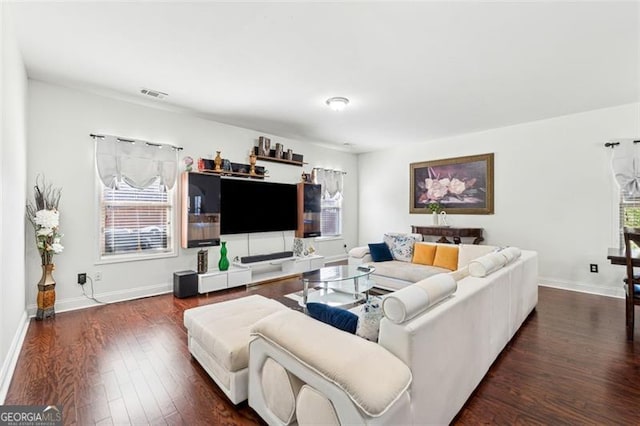 living room with dark wood-type flooring