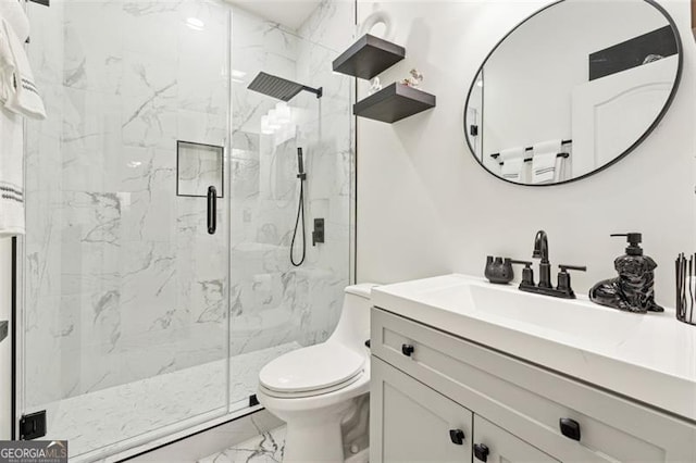 bathroom with walk in shower, vanity, and toilet