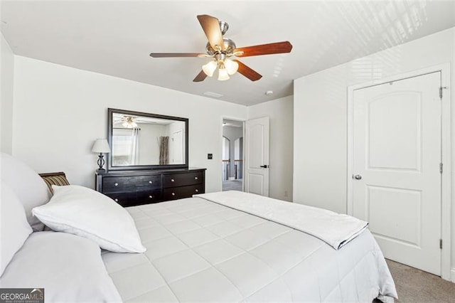 bedroom featuring carpet and ceiling fan