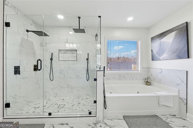 bathroom with shower with separate bathtub