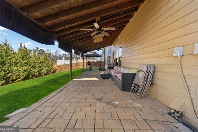 view of patio with ceiling fan and an outdoor hangout area