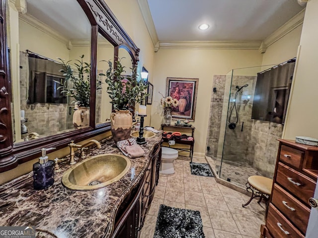 bathroom featuring toilet, ornamental molding, vanity, curtained shower, and tile patterned flooring