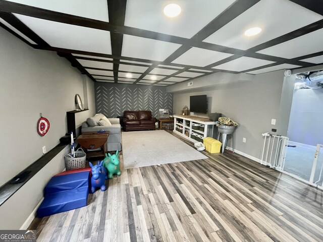 washroom featuring dark tile patterned flooring, washing machine and dryer, and cabinets