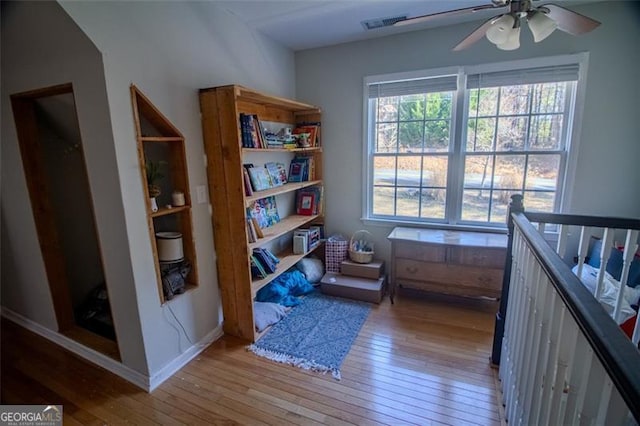 interior space featuring ceiling fan and light wood-type flooring