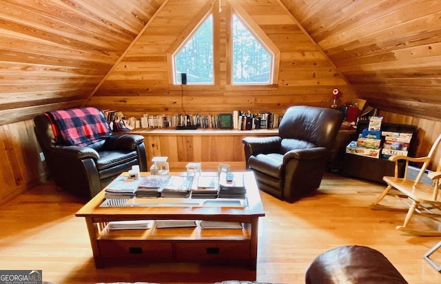 interior space featuring wood ceiling, wooden walls, and light wood-type flooring