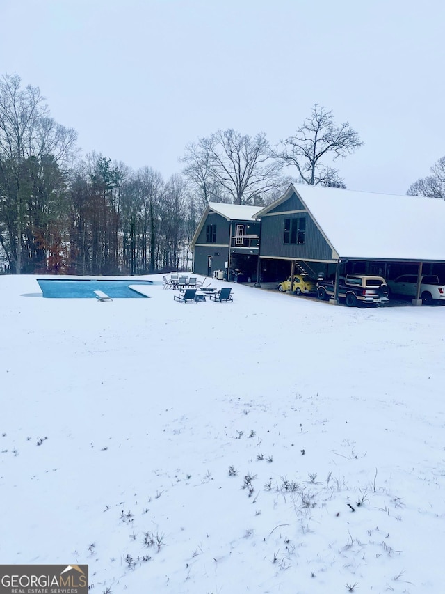 view of yard layered in snow