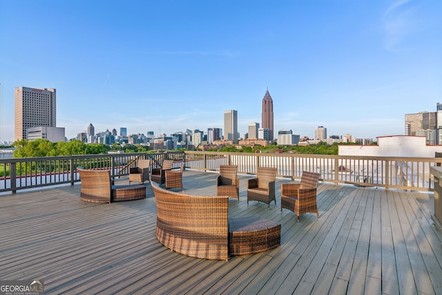 wooden deck featuring a city view