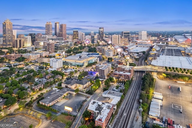 birds eye view of property with a city view