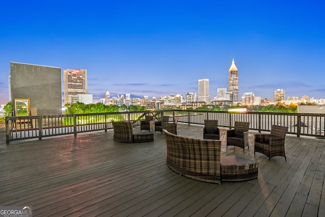 wooden deck with a view of city