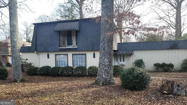 view of property exterior with a balcony