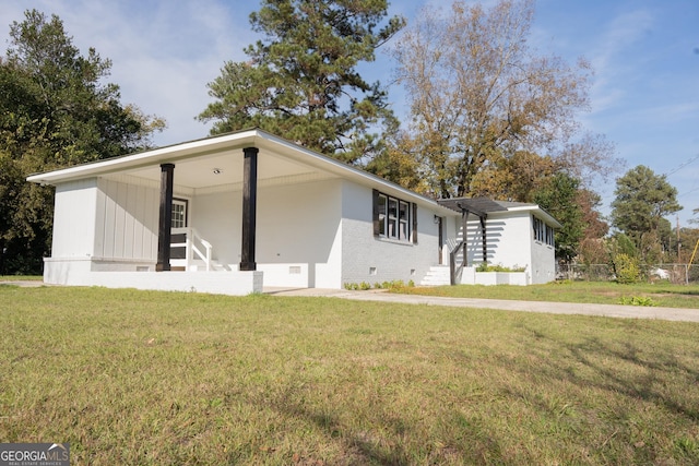 view of front of home with a front yard