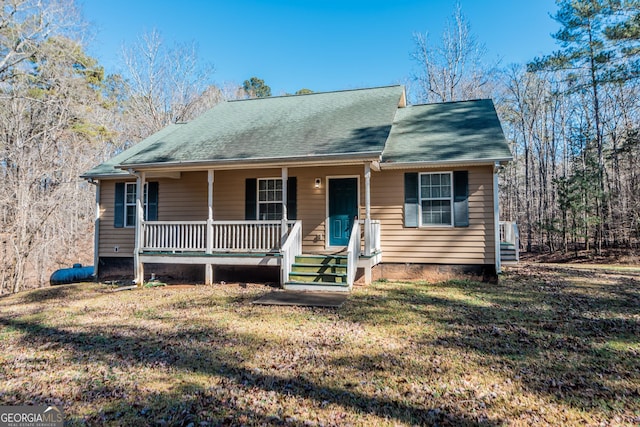 view of front of property with a front yard and a porch