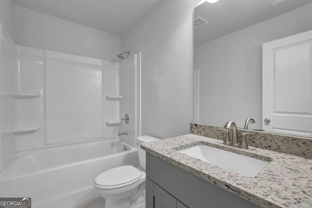 full bathroom featuring vanity,  shower combination, and toilet