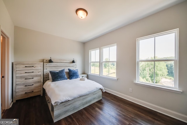 bedroom featuring dark hardwood / wood-style floors