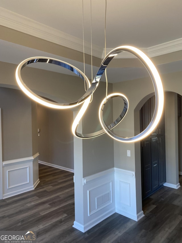 room details featuring hardwood / wood-style flooring and ornamental molding