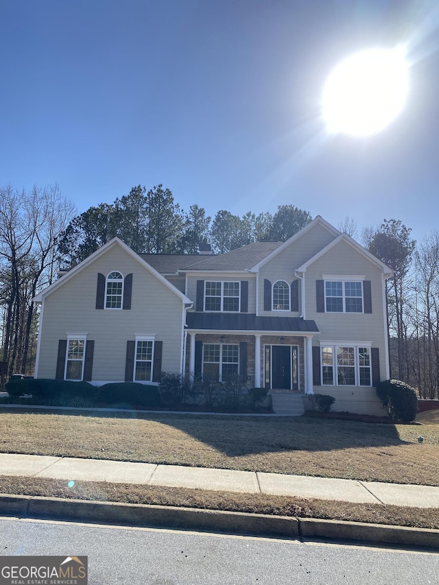 front of property featuring a front yard