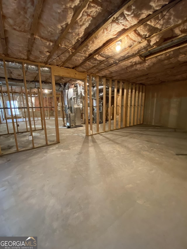 basement with heating unit