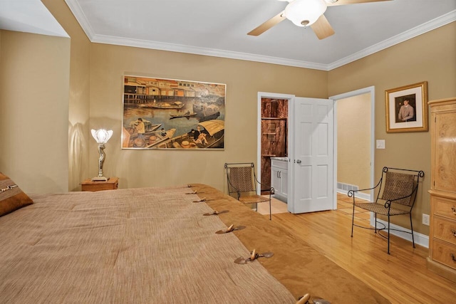 bedroom featuring ornamental molding, light hardwood / wood-style floors, and ceiling fan