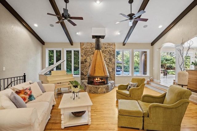 interior space featuring hardwood / wood-style flooring and lofted ceiling with beams