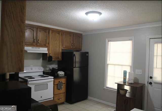 kitchen featuring ornamental molding, plenty of natural light, black refrigerator, and white electric range oven