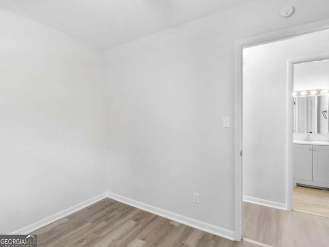 empty room with light wood-type flooring