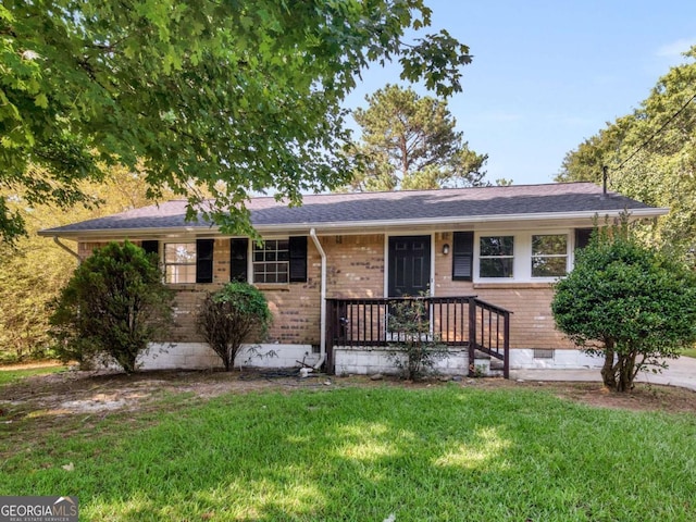 ranch-style house with a front yard