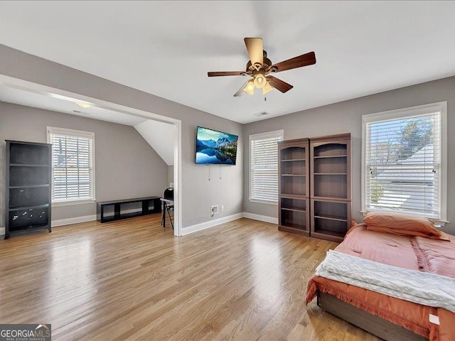 bedroom featuring ceiling fan and light hardwood / wood-style flooring