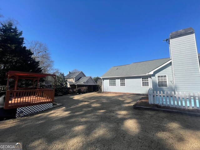 exterior space with a wooden deck