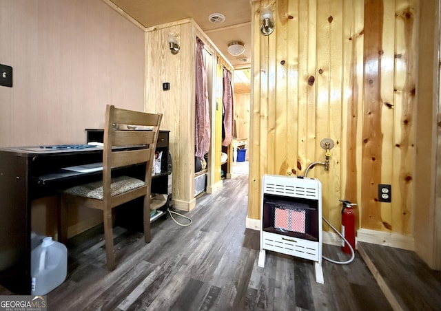 interior space featuring dark hardwood / wood-style floors and heating unit