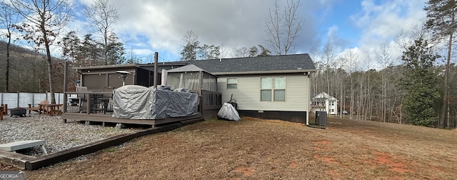 back of house featuring a gazebo, a yard, a deck, and cooling unit