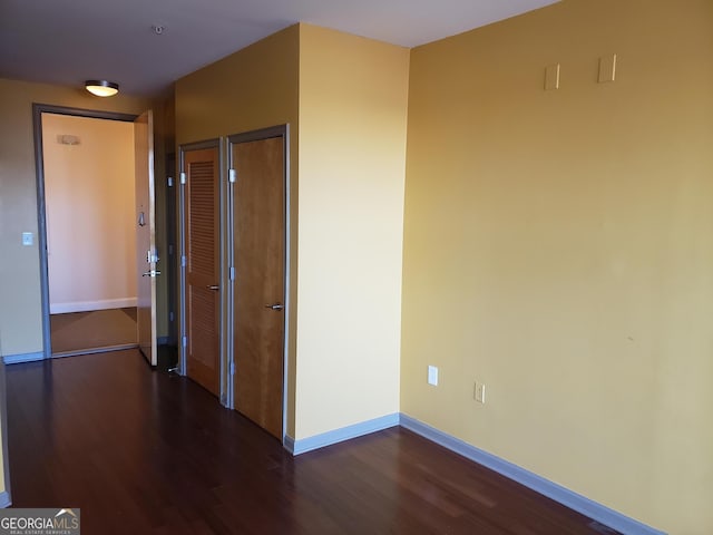 hall featuring dark hardwood / wood-style flooring