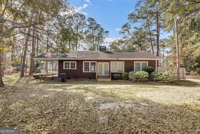 single story home featuring french doors