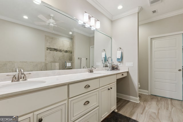 bathroom featuring crown molding, tiled shower, vanity, and ceiling fan