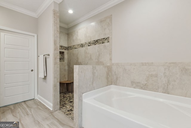 bathroom featuring ornamental molding and separate shower and tub