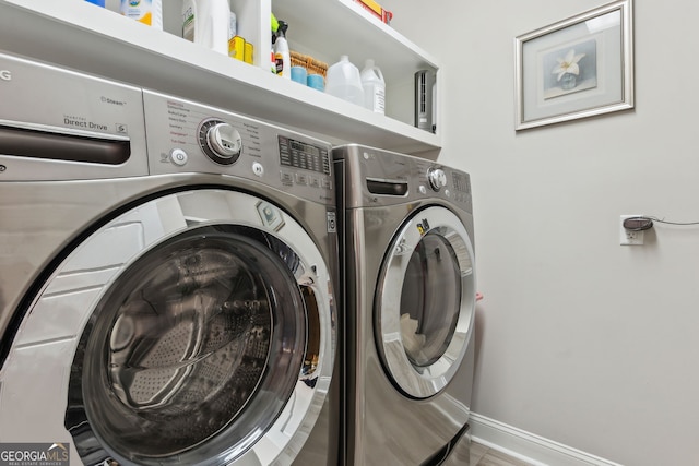 laundry room with separate washer and dryer