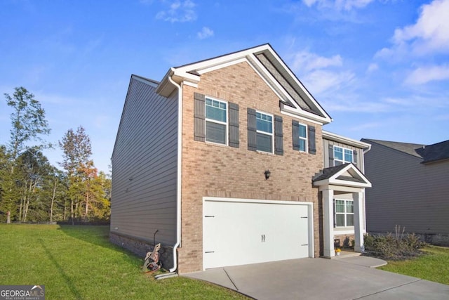 view of front of property featuring a garage and a front yard