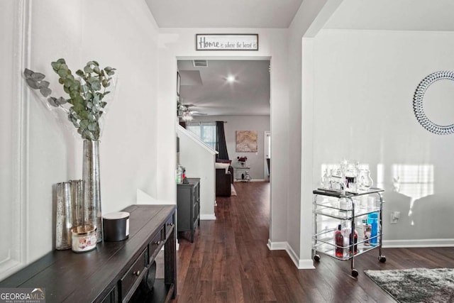 hall featuring dark hardwood / wood-style floors